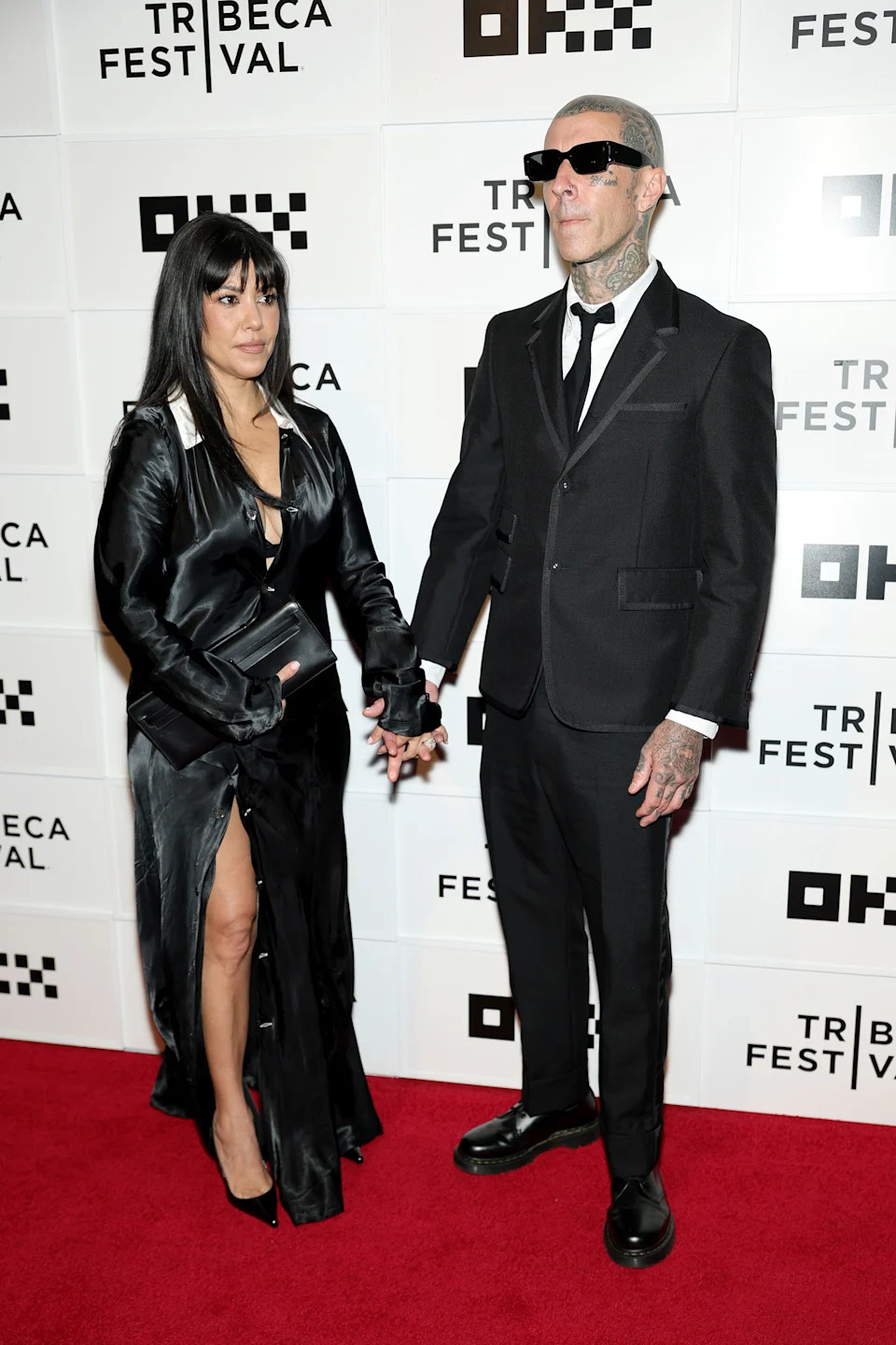 Kourtney Kardashian and Travis Barker made a rare red carpet appearance at the Tribeca Film Festival on Saturday night. Getty Images for Tribeca Festival