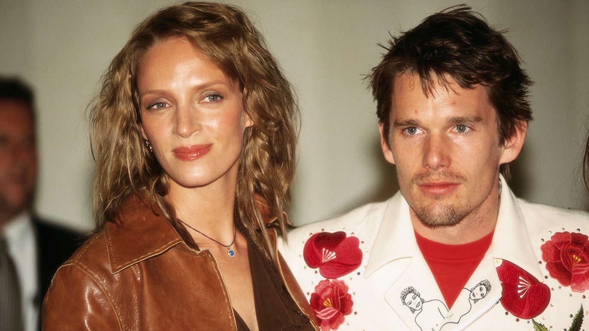 Uma Thurman and Ethan Hawke standing together
