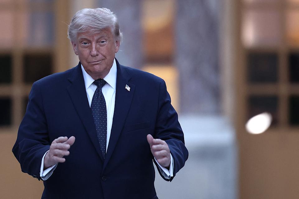 US President Donald Trump gestures as he arrives at Chateau de Versailles ahead of a dinner to celebrate the 250th anniversary of the independence of the United States, in Versailles southwest of Paris on June 17, 2026. (Photo by Guillaume BAPTISTE / AFP via Getty Images)