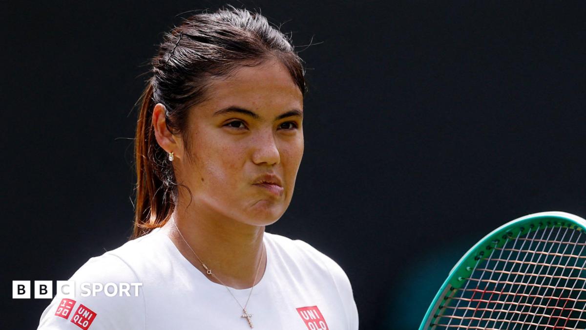 Emma Raducanu chews her lip during practice at Wimbledon