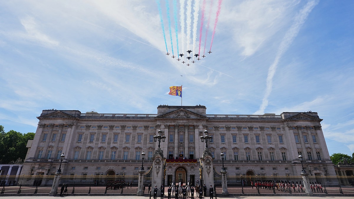 King Charles III and British family members watch Royal Air Force plane flypast over Buckingham Palace