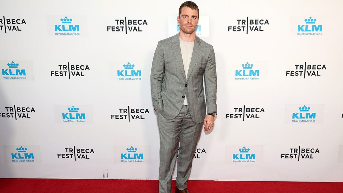 Gabriel Basso standing at the Iconoclast premiere at Village East Cinema in New York City