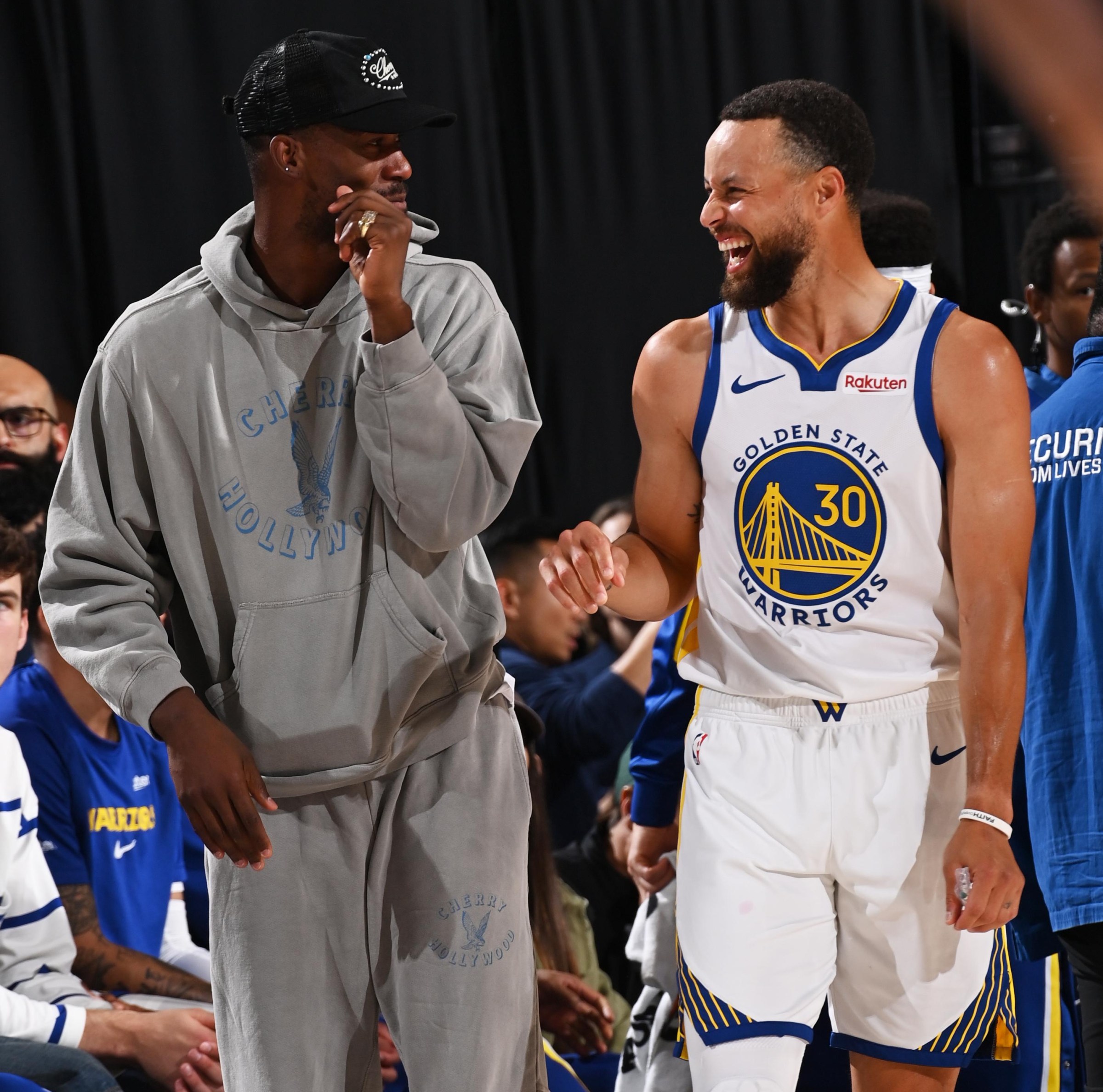 LOS ANGELES, CA - APRIL 15: Stephen Curry #30 and Jimmy Butler III #10 of the Golden State Warriors laughs during the game against the LA Clippers on April 15, 2026 at Crypto.com Arena in Los Angeles, California. NOTE TO USER: User expressly acknowledges and agrees that, by downloading and/or using this Photograph, user is consenting to the terms and conditions of the Getty Images License Agreement. Mandatory Copyright Notice: Copyright 2026 NBAE (Photo by Juan Ocampo/NBAE via Getty Images)