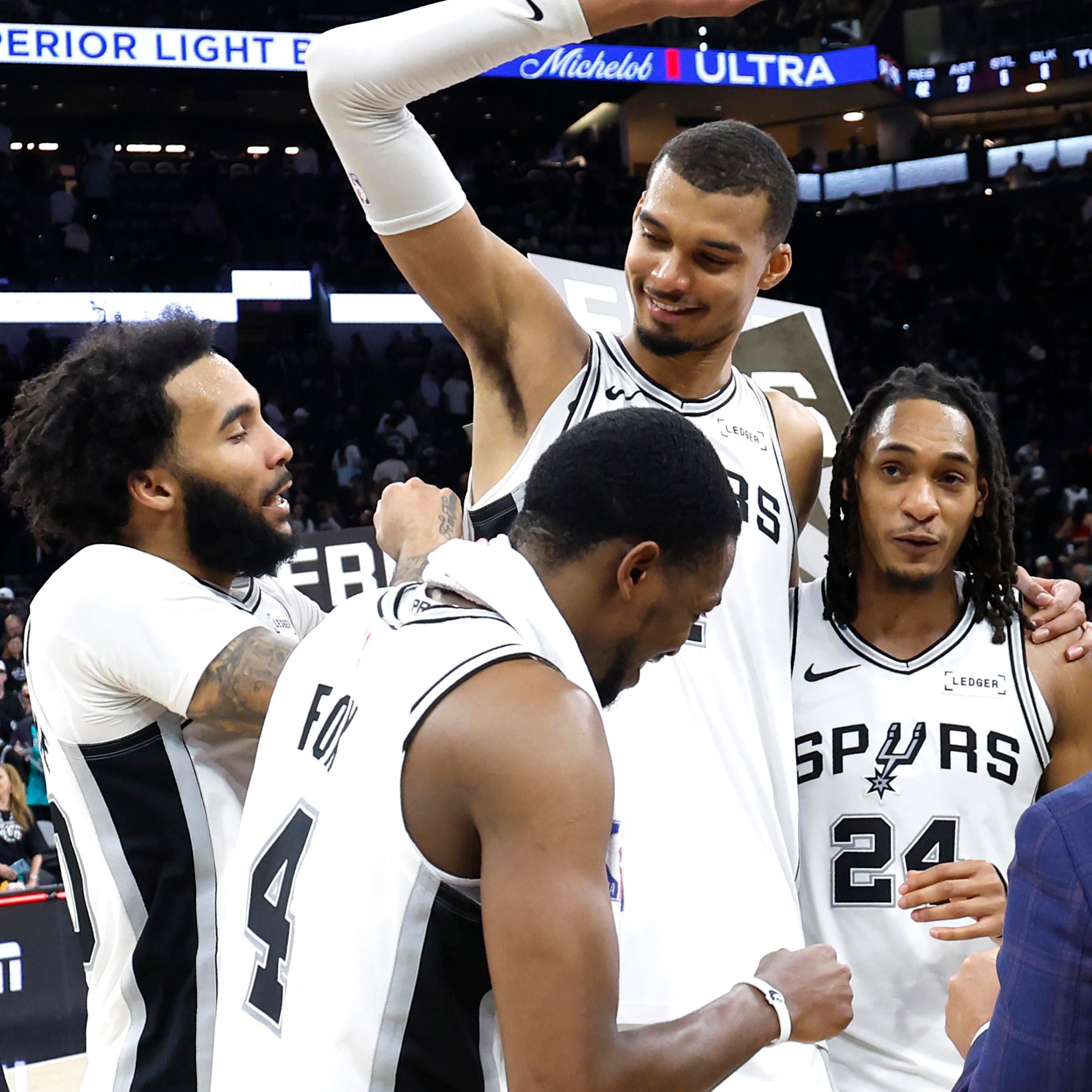 SAN ANTONIO, TEXAS - APRIL 28: Victor Wembanyama #1 of the San Antonio Spurs celebrates with teammates after the victory against the Portland Trail Blazers in Game Five of the First Round of the NBA Western Conference Playoffs at Frost Bank Center on April 28, 2026 in San Antonio, Texas. NOTE TO USER: User expressly acknowledges and agrees that, by downloading and or using this photograph, User is consenting to the terms and conditions of the Getty Images License Agreement. (Photo by Ronald Cortes/Getty Images)