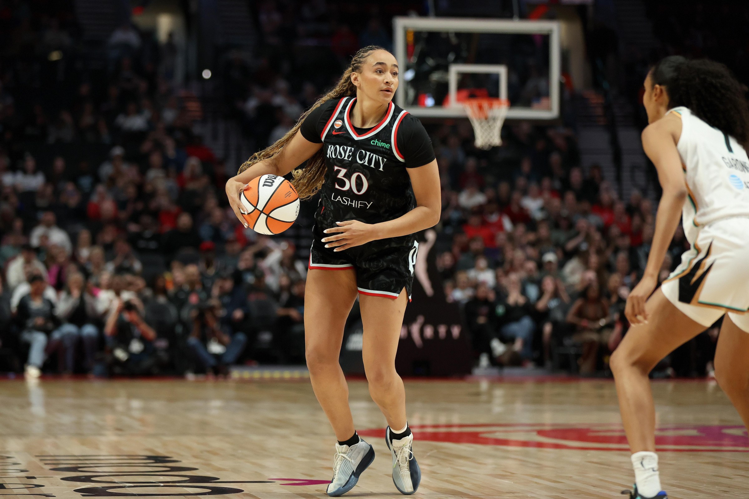 PORTLAND, OR - MAY 14: Haley Jones #30 of the Portland Fire handles the ball during the game against the New York Liberty on May 14, 2026 at Moda Center in Portland, Oregon. NOTE TO USER: User expressly acknowledges and agrees that, by downloading and or using this Photograph, user is consenting to the terms and conditions of the Getty Images License Agreement. Mandatory Copyright Notice: Copyright 2026 NBAE (Photo by Amanda Loman/NBAE via Getty Images)