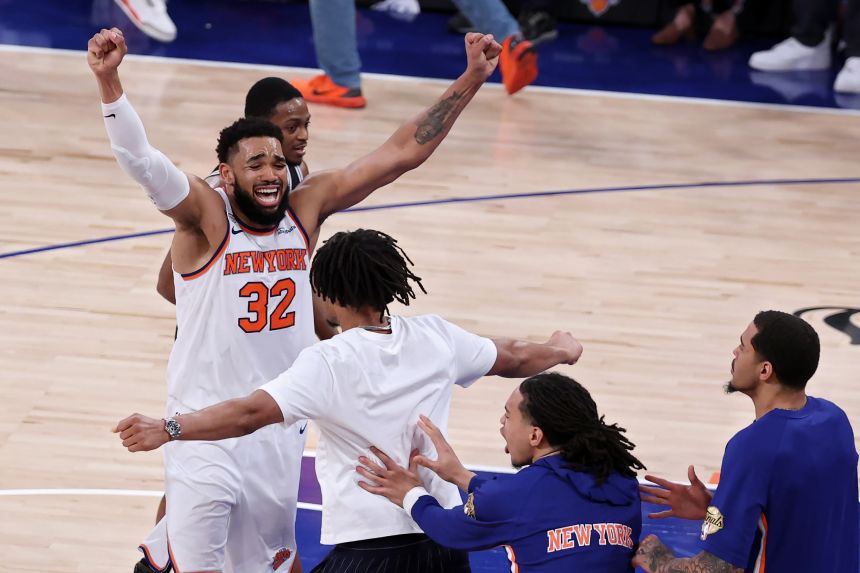 Karl-Anthony Towns #32 of the New York Knicks celebrates after his team's 107-106 victory against the San Antonio Spurs in Game Four of the 2026 NBA Finals at Madison Square Garden on Wednesday.
