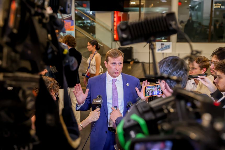 Representative Dan Goldman, a Democrat from New York, speaks with members of the media during a primary election night watch party in New York on Tuesday.