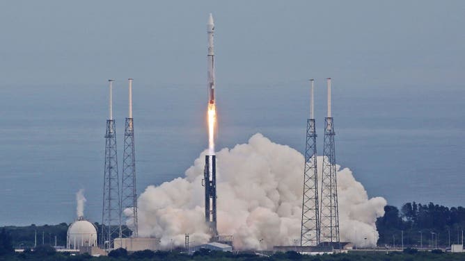 An AtlasV rocket, carrying the Maven spacecraft, blasts off at Cape Canaveral Air Force Station, Fla., on Monday, Nov. 18, 20131. Maven is on a 10-month journey will directly assess the atmosphere of the planet Mars.