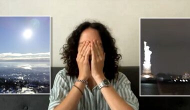 A person with curly hair covers their face with both hands while sitting on a couch. On either side are inset images: a bright sun over a snowy landscape on the left and a blurry night view of the Statue of Liberty on the right.