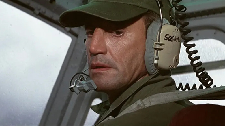 Frank Murphy flies his helicopter and looks sweaty in Blue Thunder