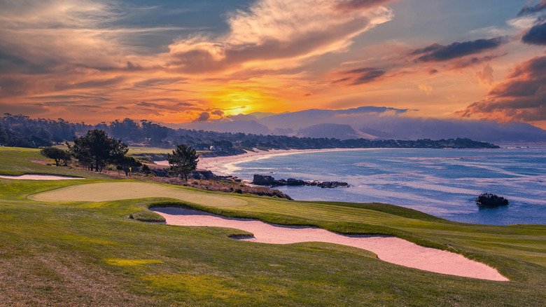 A view of Pebble Beach golf course, Monterey, California, USA, with a gorgeous sunset