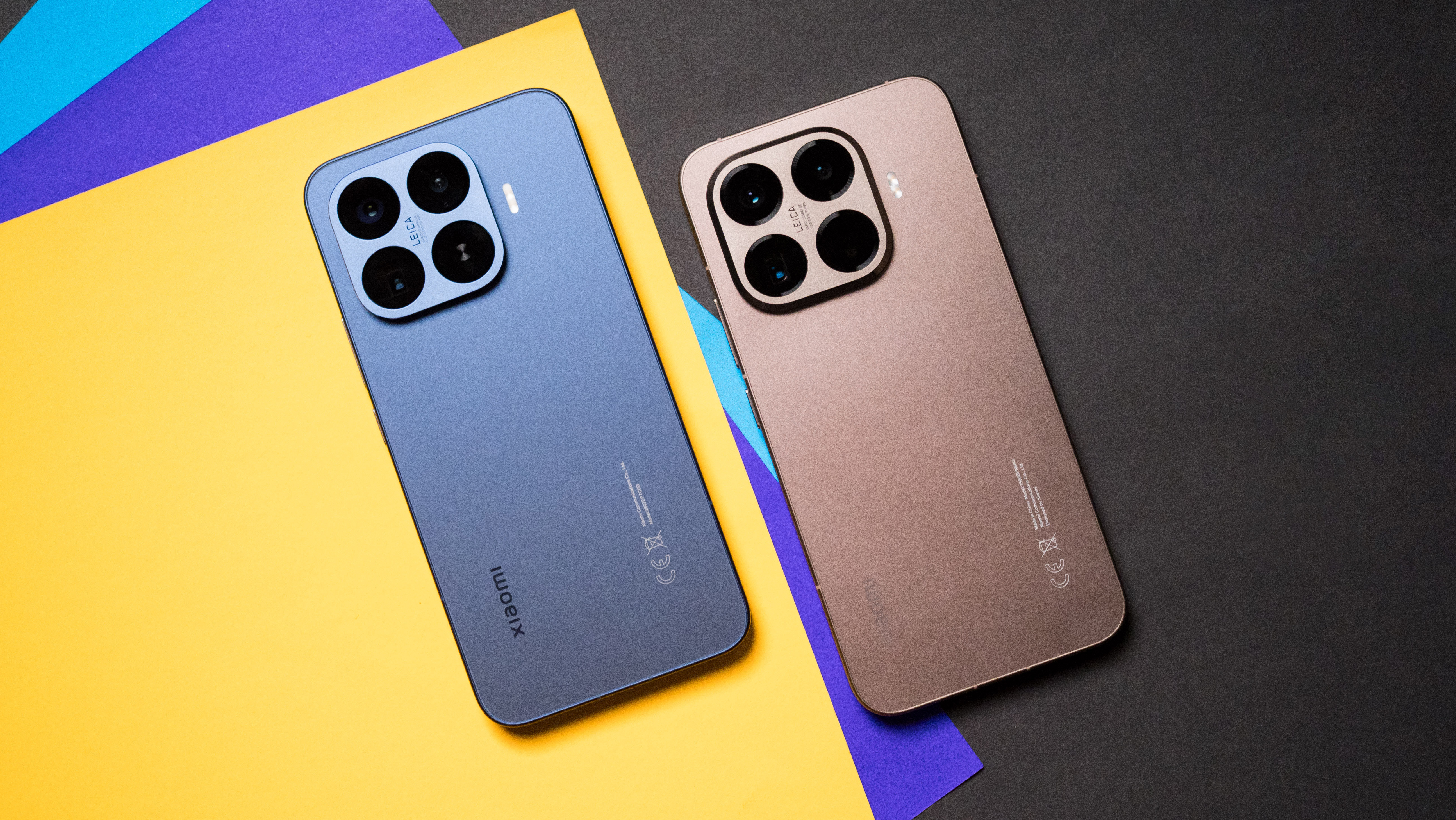 Xiaomi 17T Pro and 15T Pro rear view against a colorful craft sheet highlighting the design