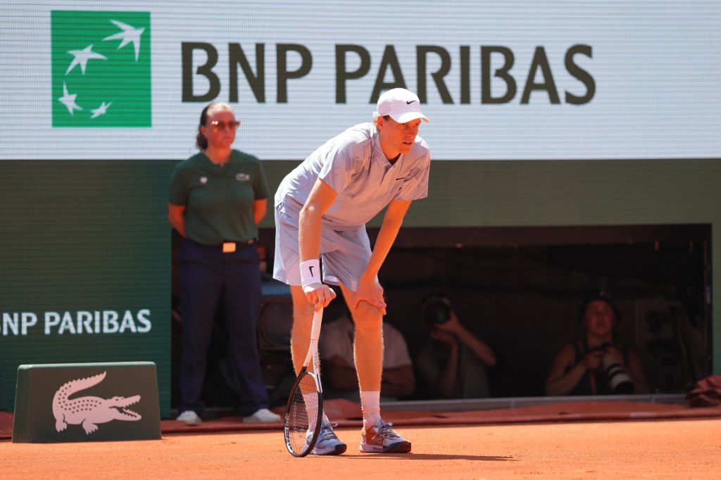Jannick Sinner of Italy looking ill during the French Open at Stade Roland Garros.