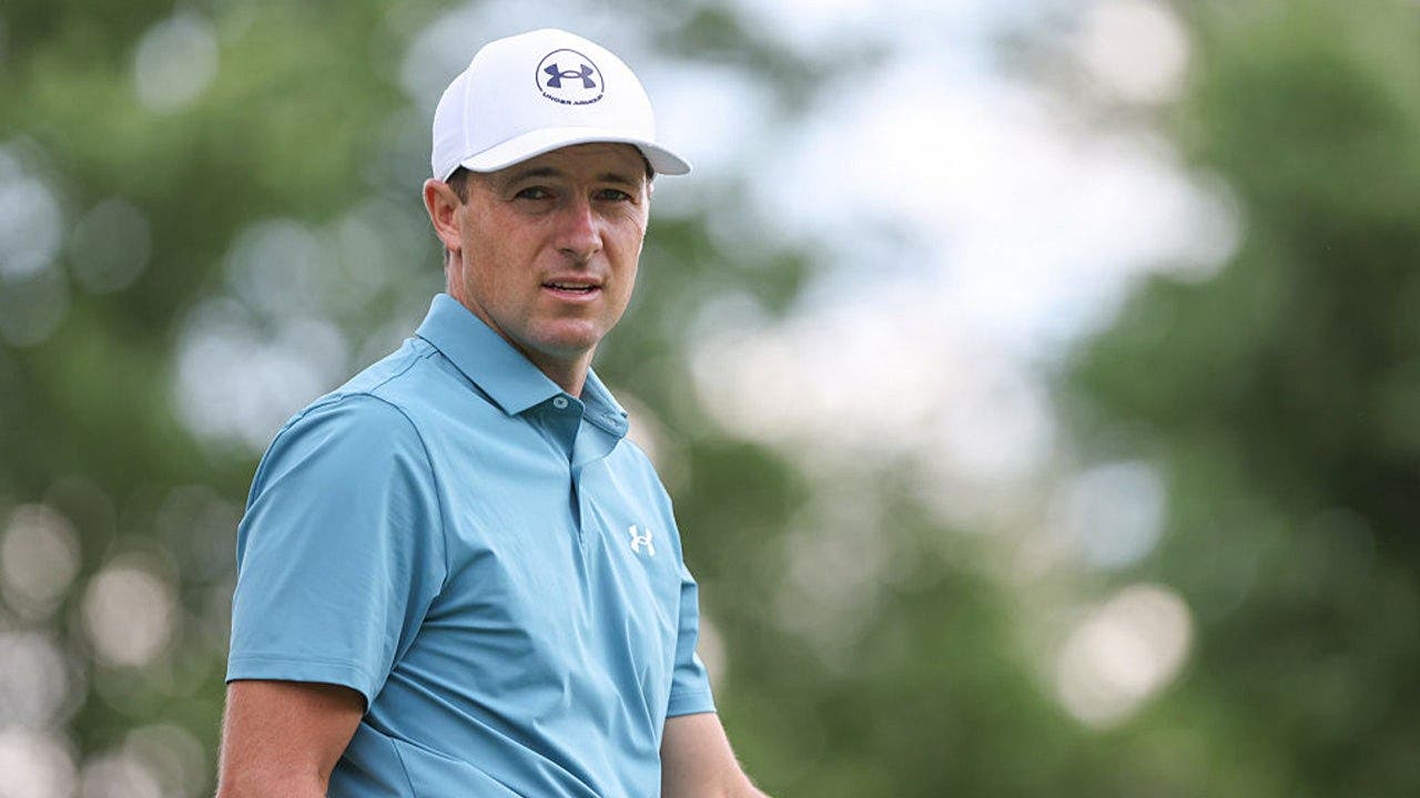 Jordan Spieth nearly hits someone in the head with his golf shot during US Open practice round at Shinnecock