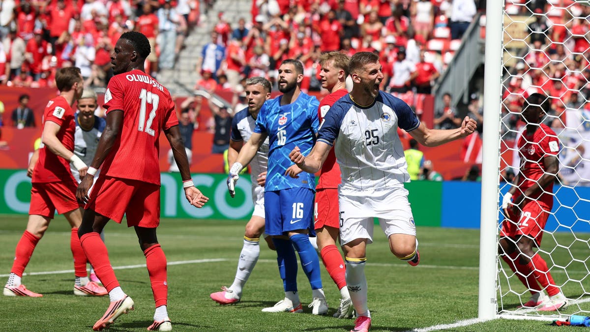 Jovo Lukic celebrating after scoring a goal during a soccer match in Toronto