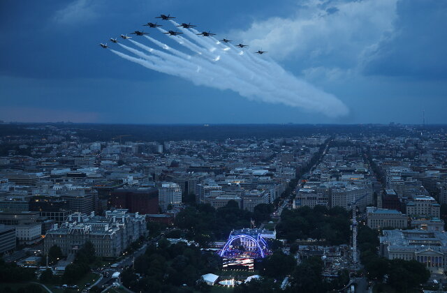 TOPSHOT - US Air Force Thunderbirds and the US Navy Blue Angels perform a flyover during the National Anthem at UFC Freedom 250 on the South Lawn of the White House, in Washington, DC, on June 14, 2026. (Photo by Win McNamee / POOL / AFP via Getty Images)