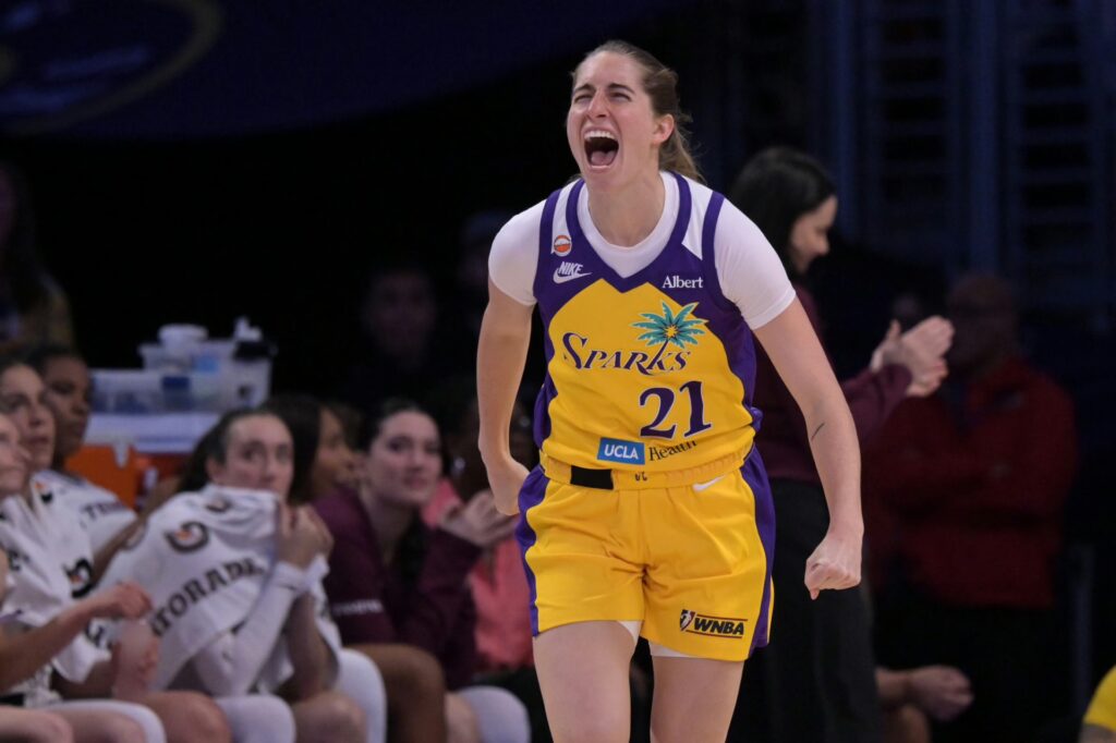 Los Angeles Sparks guard Kate Martin (21) reacts after a three-point basket during the first half against the Toronto Tempo at Crypto.com Arena.