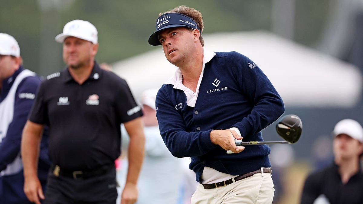 Keith Mitchell playing a tee shot on the 18th hole at the U.S. Open golf tournament.