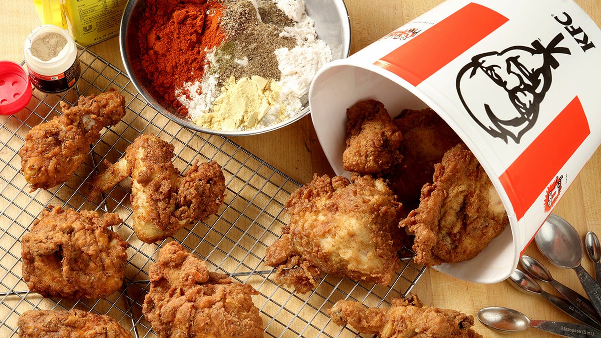 KFC fried chicken pieces on a table.