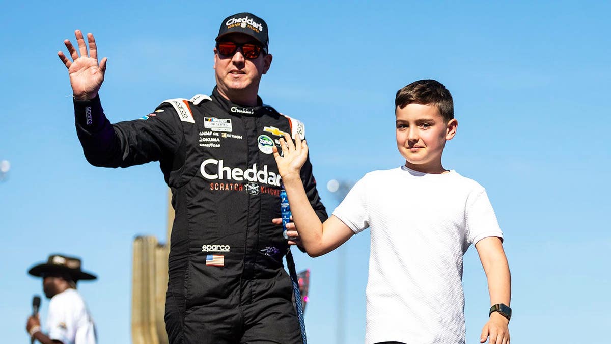 NASCAR Cup Series driver Kyle Busch with son Brexton Busch at Phoenix Raceway