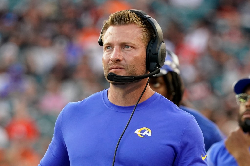 Los Angeles Rams head coach Sean McVay wearing a headset on the sideline.