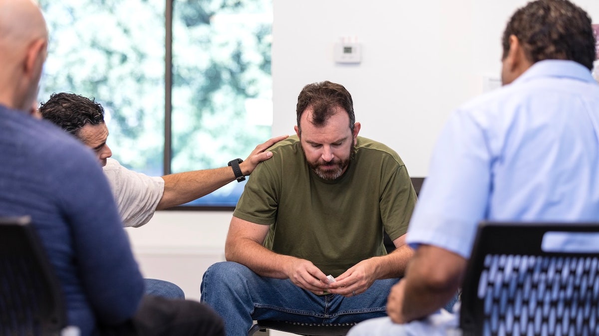 Man in therapy with PTSD
