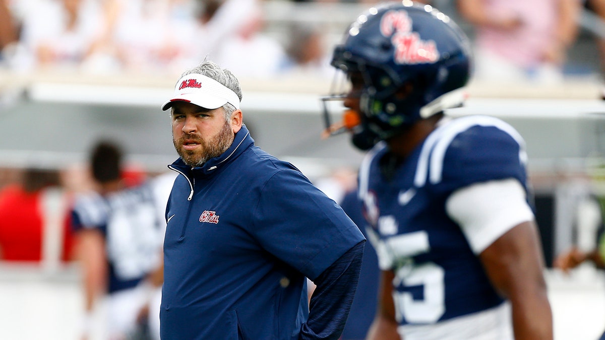 Pete Golding watching warm ups at Vaught-Hemingway Stadium in Oxford, Mississippi