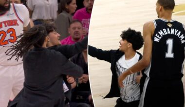 Selfie-taking fan storms court in surreal NBA Finals Game 1 scene