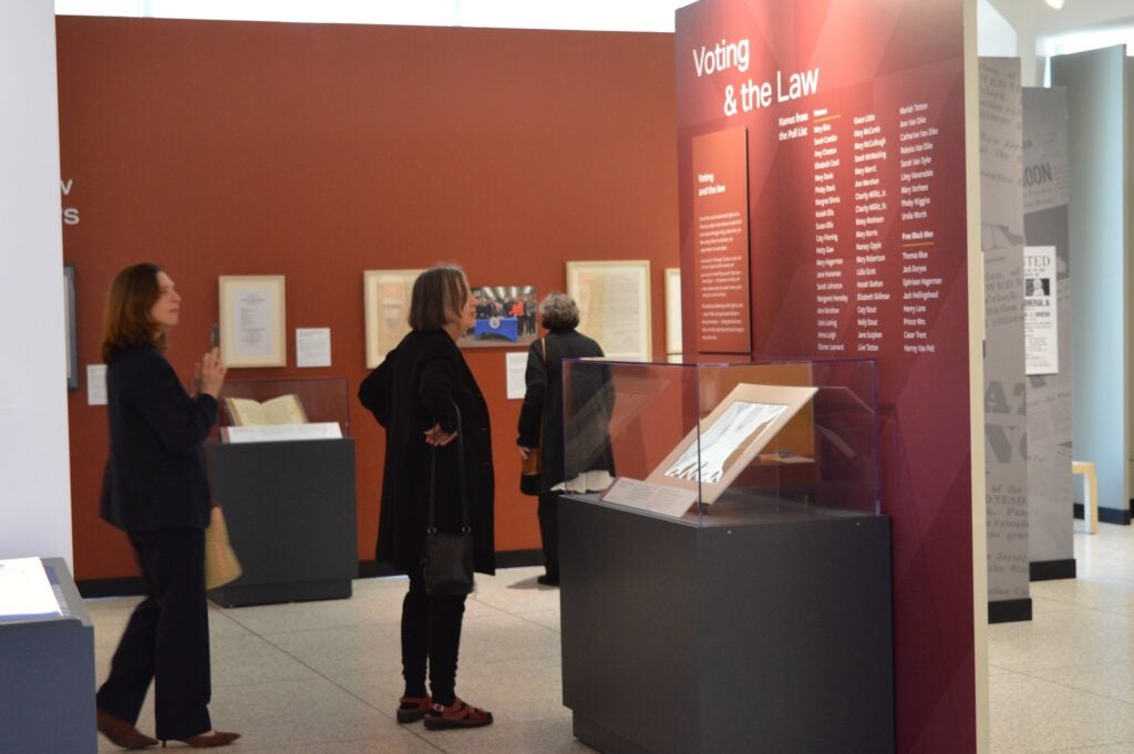 Documents and artifacts on display in the exhibit.
