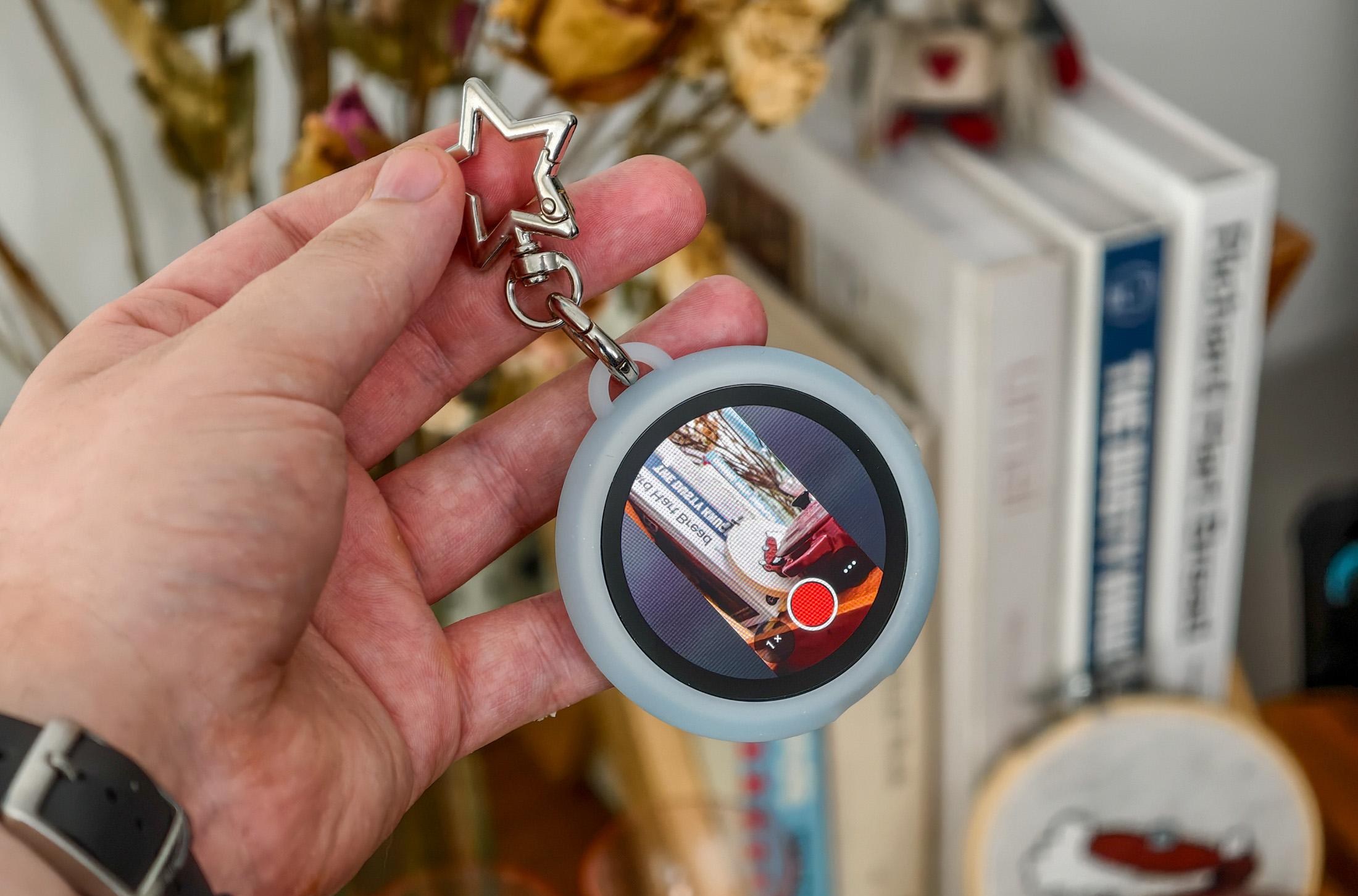 Photo of Oppo Bubble in its case with a star lanyard attachment
