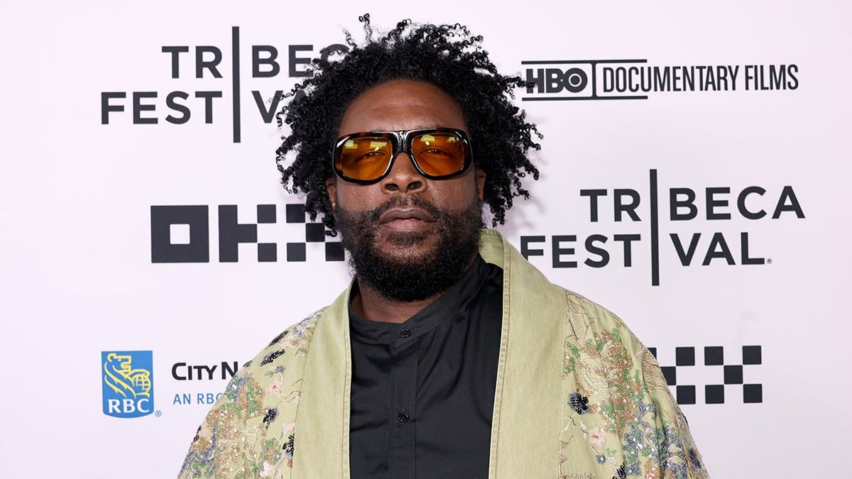 Ahmir Questlove Thompson standing at the Earth Wind and Fire opening night premiere at Beacon Theatre