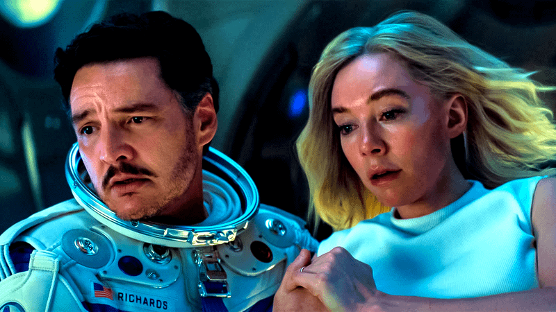Pedro Pascal as Reed Richards and Vanessa Kirby as Sue Storm floating in their spaceship in 'The Fantastic Four: First Steps.'