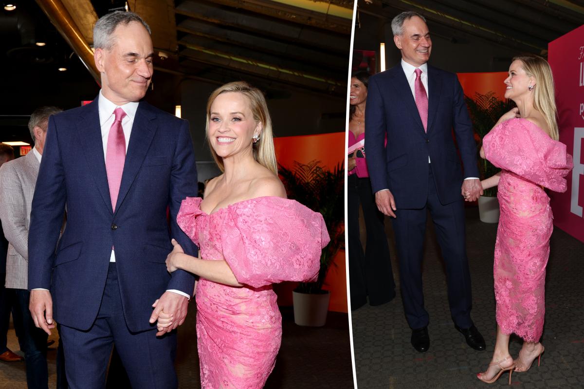 Reese Witherspoon shares rare PDA moment with billionaire boyfriend Oliver Haarmann at 'Elle' premiere