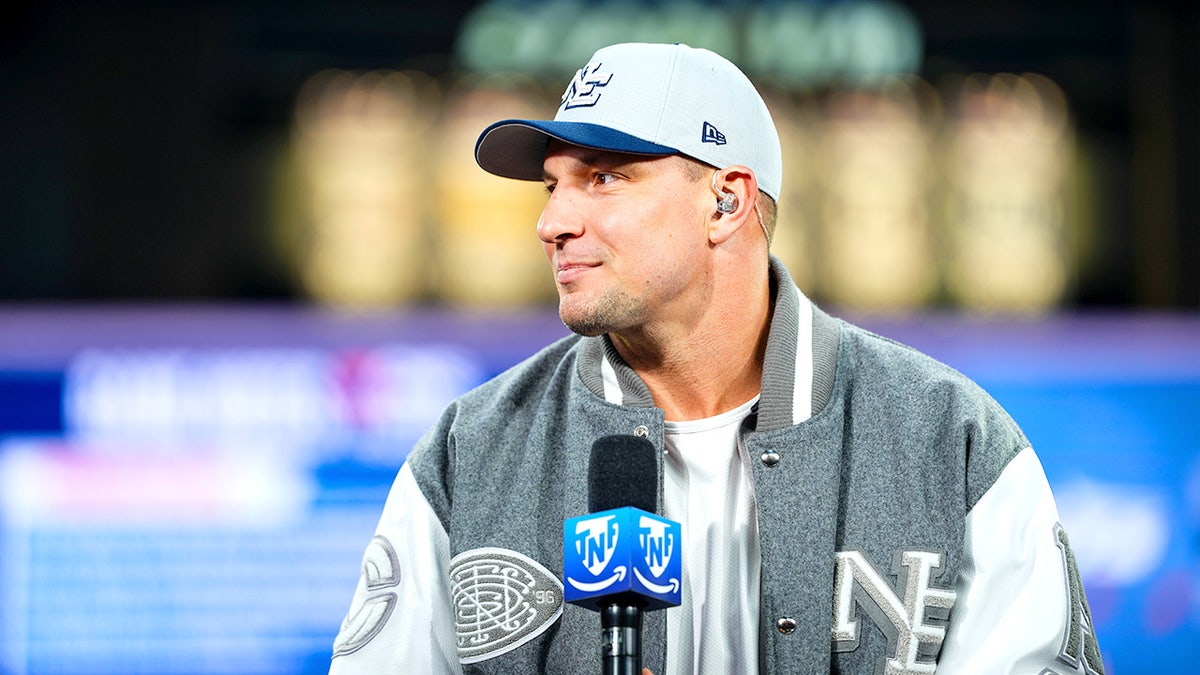 Rob Gronkowski smiling while visiting Thursday Night Football on Prime set at Gillette Stadium