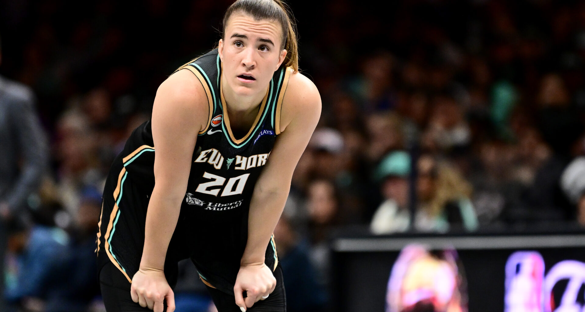 Sabrina Ionescu takes a breather during a New York Liberty-Dallas Wings game in May 2026.
