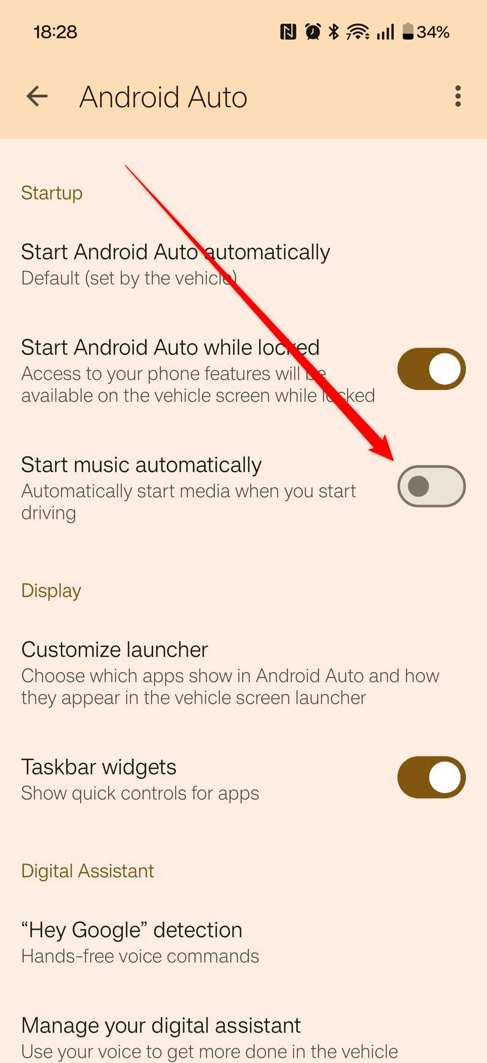 The "Start music automatically" option disabled in Android Auto.