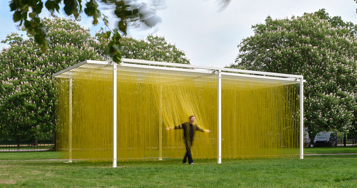 jesús rafael soto suspends 4,000 yellow strands for serpentine