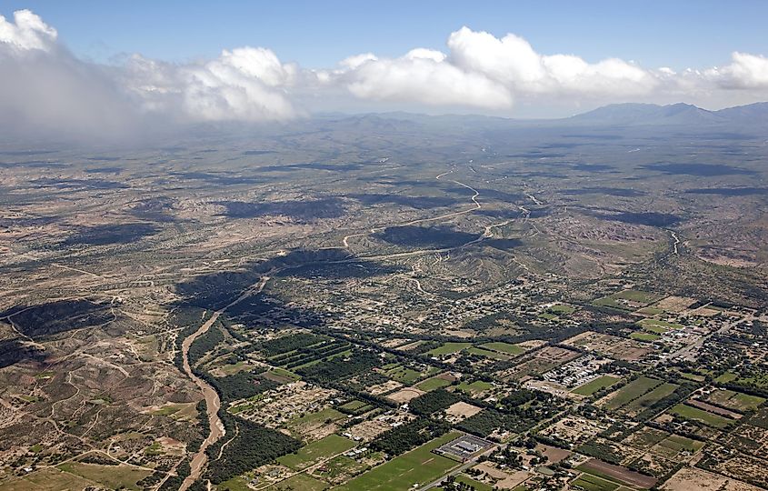 Aerial view of the green corridor of the San Pedro River crossing the Arizona desert