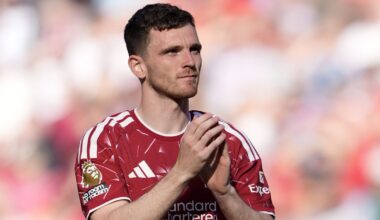 Andy Robertson applauds the fans at Anfield after his final Liverpool appearance