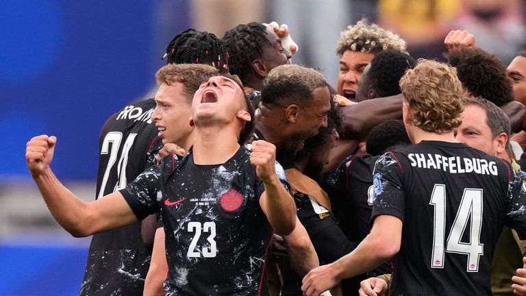 Players of Canada celebrate after Stephen Eustaquio scored winner