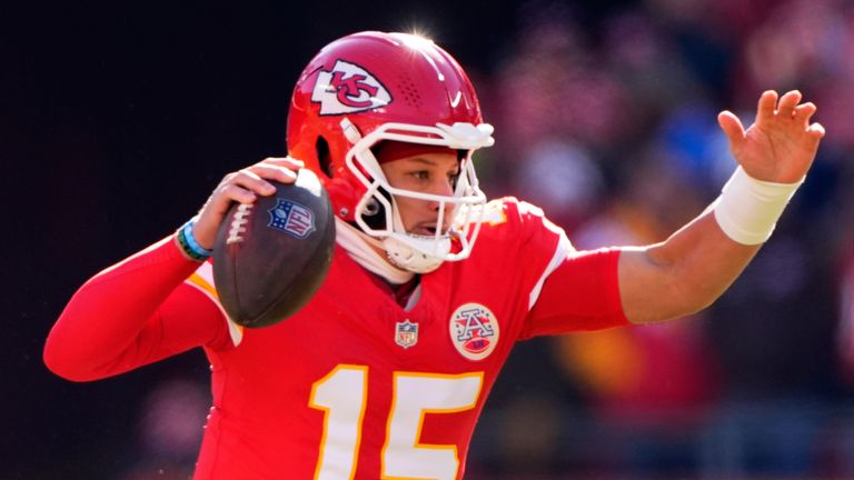 Kansas City Chiefs quarterback Patrick Mahomes (15) scrambles during the first half of an NFL football game against the Los Angeles Chargers Sunday, Dec. 14, 2025, in Kansas City, Mo. (AP Photo/Charlie Riedel)