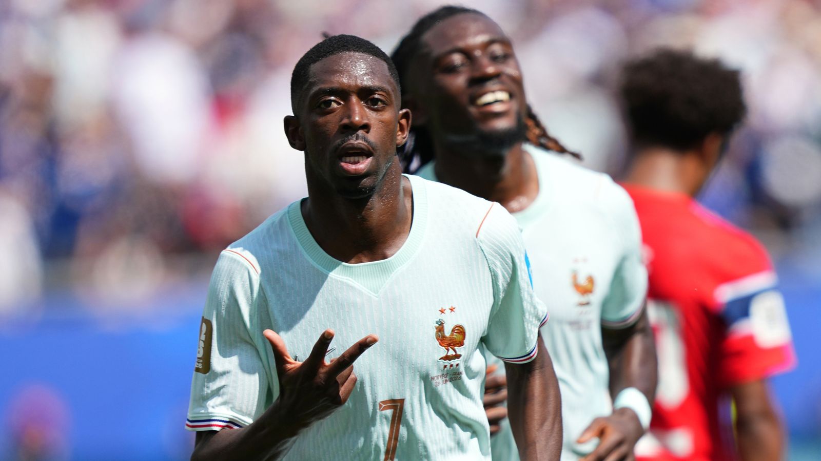 France's Ousmane Dembele celebrates after completing his hat-trick