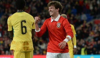 Lewis Koumas celebrates scoring his first international goal