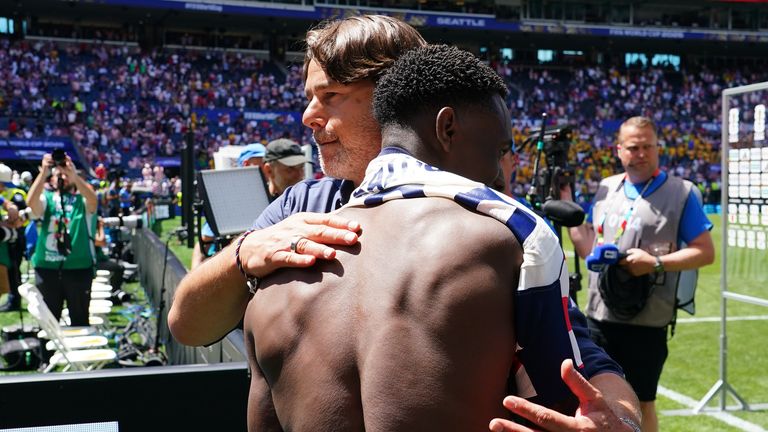 Mauricio Pochettino hugs Folarin Balogun after the game