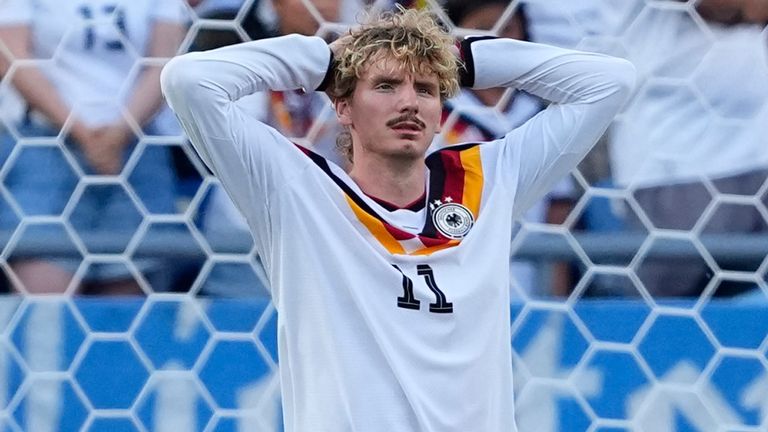 Germany's Nick Woltemade (11) reacts after failing to score during a penalty shootout at the end of during the World Cup round of 32