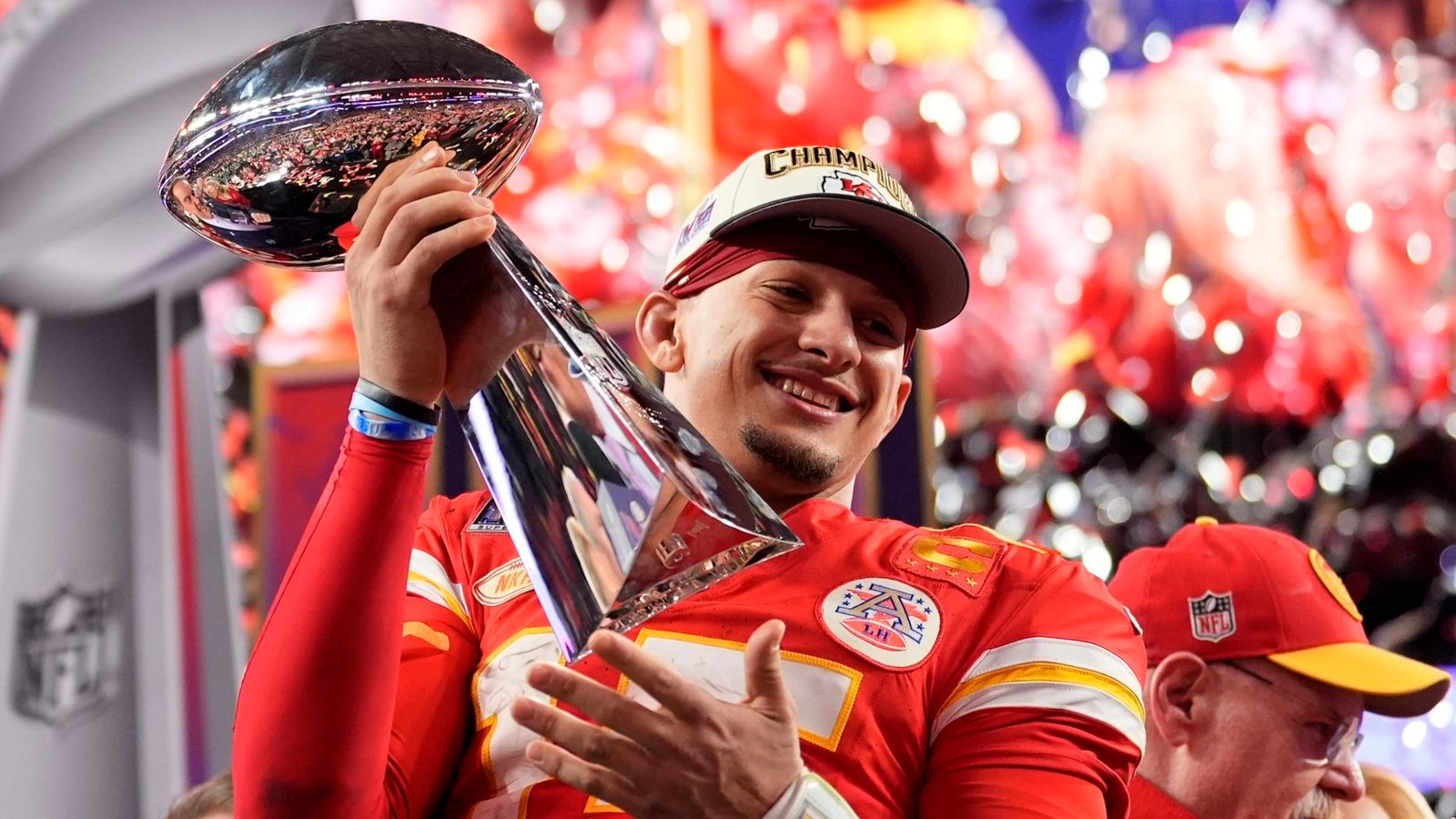 FILE - Kansas City Chiefs quarterback Patrick Mahomes celebrates with the trophy after the team's win in overtime during the NFL Super Bowl 58 football game against the San Francisco 49ers, Sunday, Feb. 11, 2024, in Las Vegas. Mahomes and the Chiefs are aiming to become the first team to three-peat since the 1965-67 Green Bay Packers won three consecutive NFL championships. (AP Photo/Ashley Landis, File)