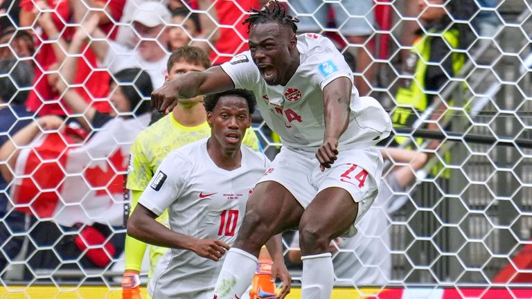 Canada's Promise David celebrates his goal against Switzerland (AP Photo/Abbie Parr)