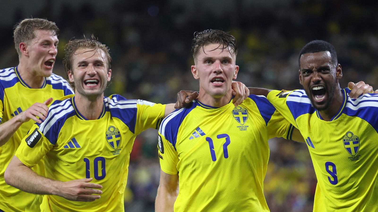 Viktor Gyokeres and Alexander Isak celebrate during Sweden's win