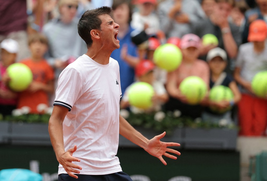 Spanish tennis player Rafael Jodar celebrating his victory at the French Open.