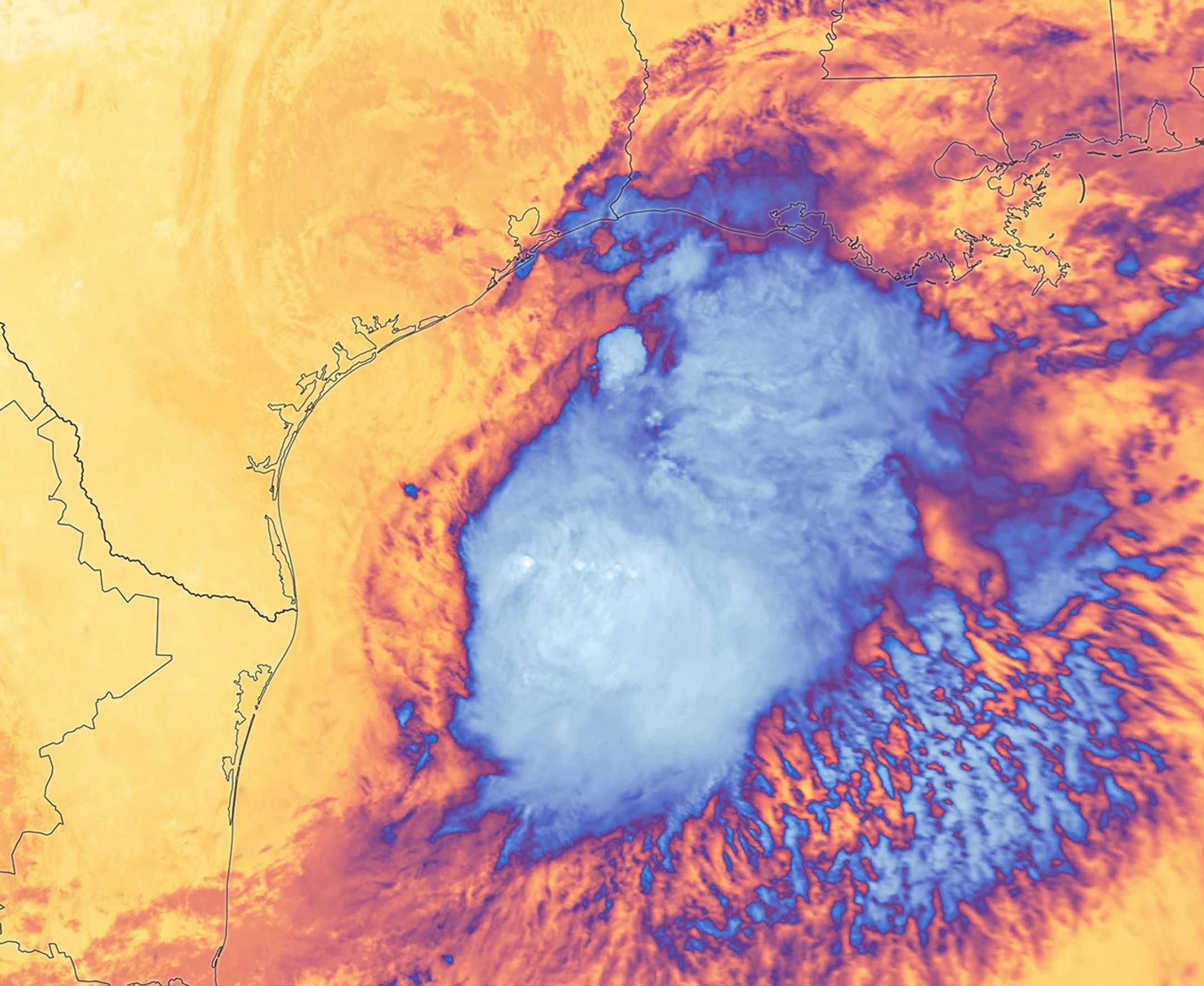 White and purple areas of cloud off the Gulf Coast indicate the cooler areas of cloud tops associated with Tropical Storm Arthur.